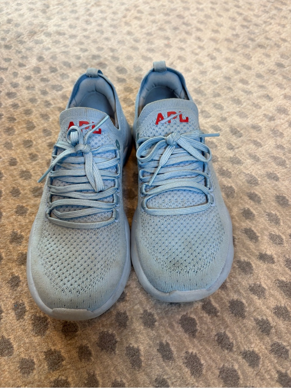 APL Knit Running Sneakers in Pale Blue with Red Logo